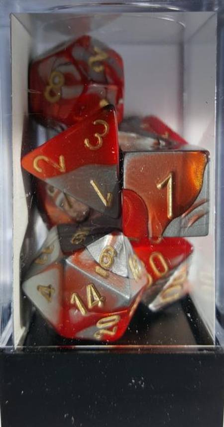 Buy Gemini Orange-Steel w/gold Polyhedral 7-Die Set in NZ. 